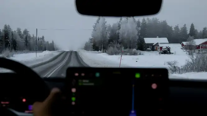 Driving on a snowy road La Plagne