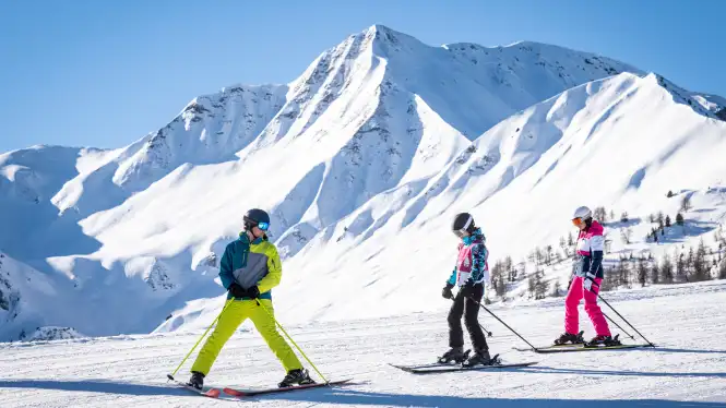 learning to ski or snowboard in La Plagne