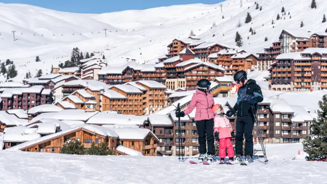 Ski family in La Plagne above Plagne Soleil
